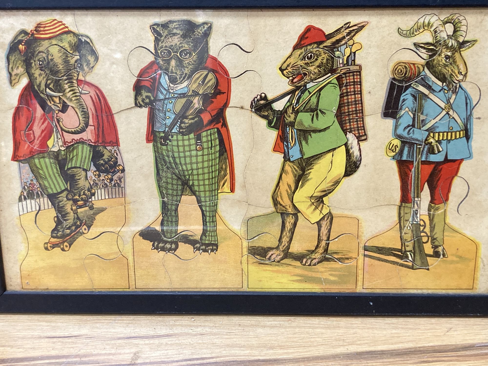 A group of Victorian and later chromolithographs and colour prints, including The tail-less donkey, 54 x 72cm and two jig-saw puzzles